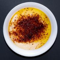 Hummus · Chickpeas, tahini, garlic, lemon and juice.