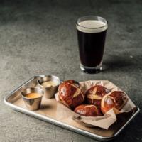 Pretzel Bread · 4 mini buns served hot from the oven with a side of cheese sauce and Sierra Nevada beer must...