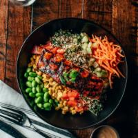 Blackened Salmon Salad · Scottish salmon lightly blackened and drizzled with a sweet chili sauce served atop a bed of...