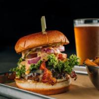 Taphouse Burger · Jalapeno bacon, Swiss, roasted garlic mayo and signature Taphouse sauce. Served with lettuce...