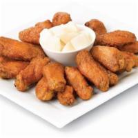 Chicken Wings · Our famous fried chicken wings. Half & Half of Soy Garlic and Spicy is most popular!