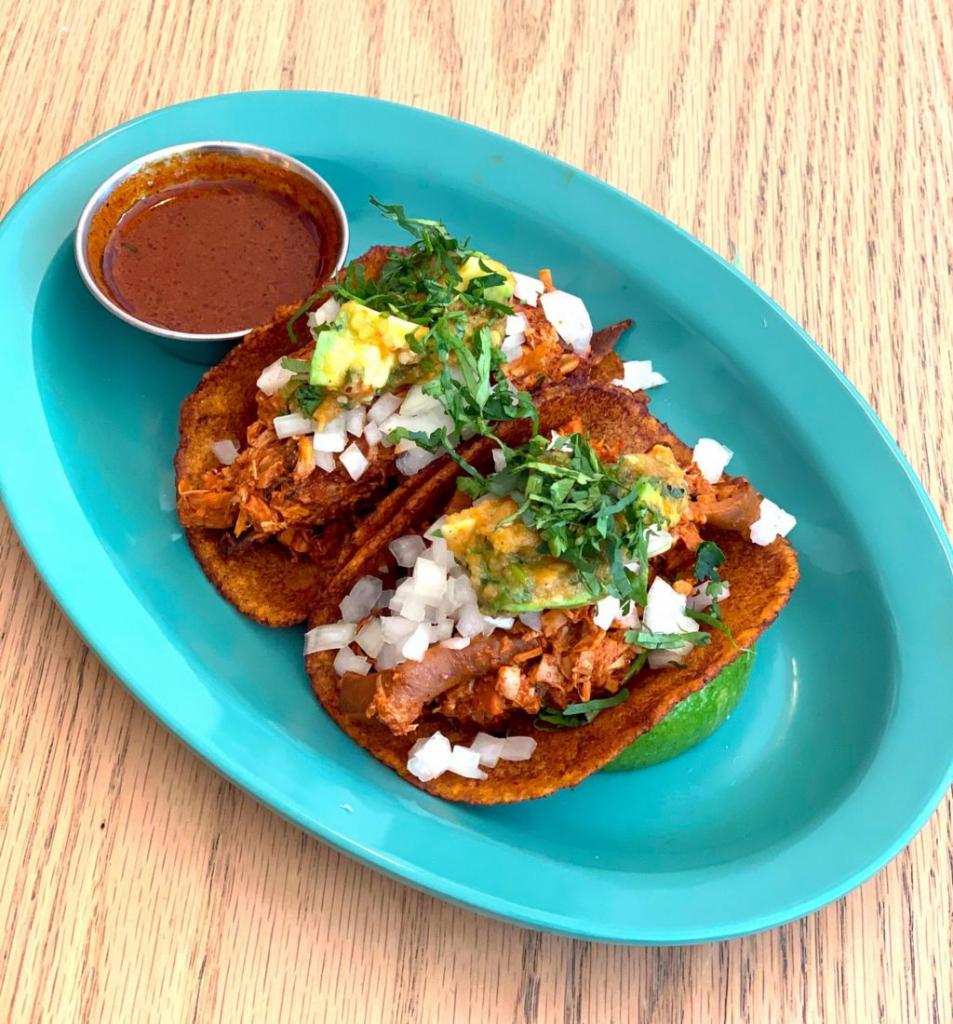 Spicy Birria Taco · Banana blossoms, avocado, salsa botanera, cilantro.