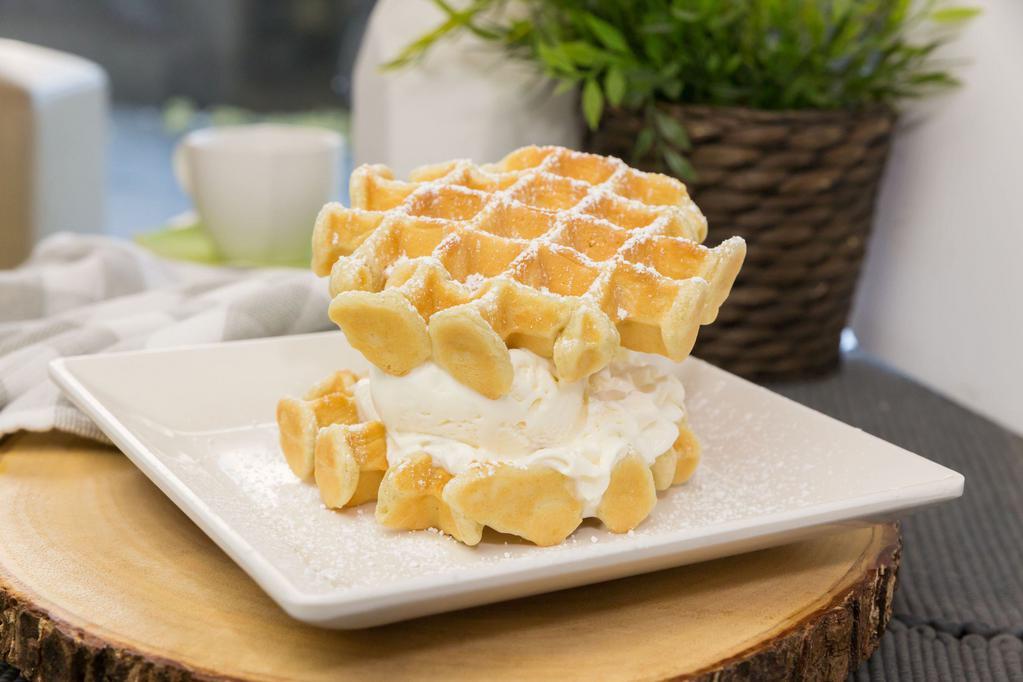 I06. Waffle Ice Cream Sandwich · Choice of mango, green tea, vanilla, coconut or durian. Additional ice cream scoop for an additional charge.