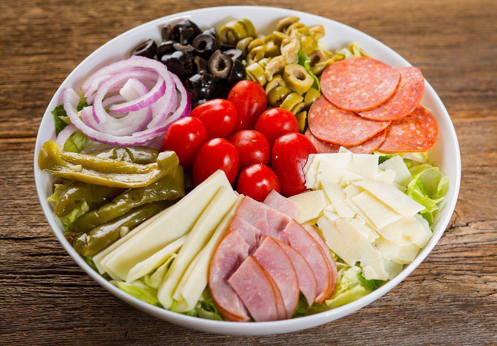 Rosati's Antipasto Salad · Romaine and iceberg lettuce, spinach leaves, green pepper, red onion, black and green olives, pepperoni, Canadian bacon, grape tomato, mozzarella cheese and shaved Asiago cheese. Served with a choice of dressing.