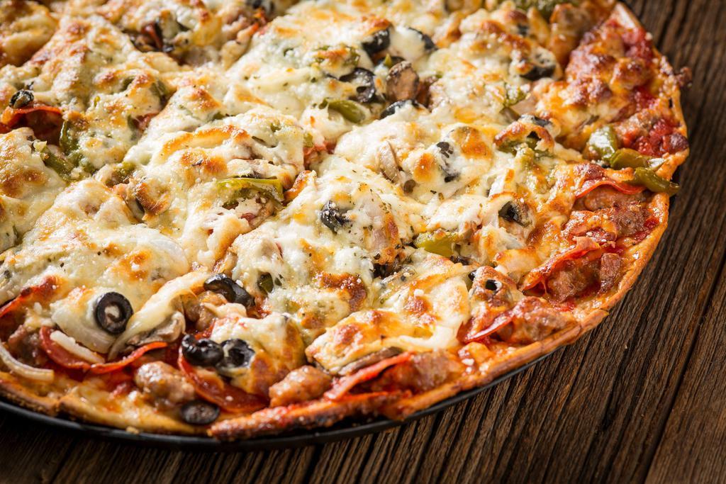 Classic Combo Pizza · Gourmet Italian sausage, pepperoni, mushroom, onion, green pepper and black olive.
