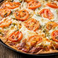 The Veggie Pizza · Mushroom, onion, green pepper, sliced tomato on top. Vegetarian.