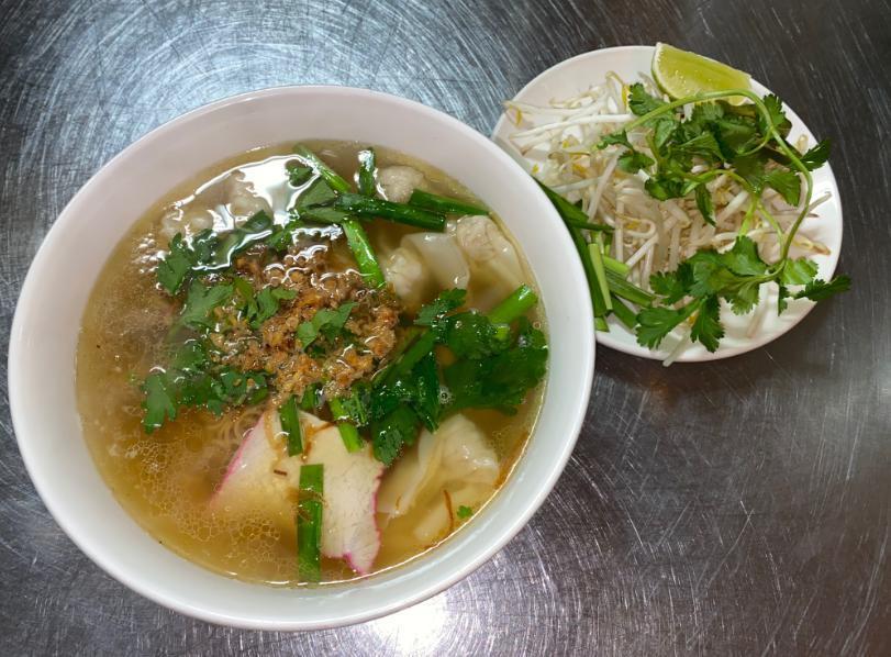 24. Mi Hoanh Thanh · Wonton noodle soup. Shrimp and pork wontons, BBQ pork, and minced pork in a savory pork broth with egg noodles topped with fried shallots and chives.