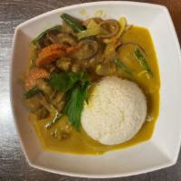 44. Com Ga Ca Ri  · Vietnamese chicken curry. Chicken tenders yarns and onion in a medium spicy yellow curry sau...