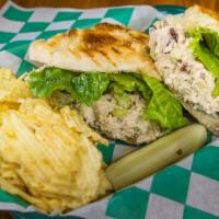 Chicken Salad Sandwich · Roasted chicken breast, celery, grapes, pecans, and lettuce. Served on European bread, pickl...