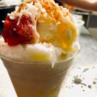 Coco Heaven large · Pina and coconut shaved ice toppings strawberries and pineapple with milky sauce. 