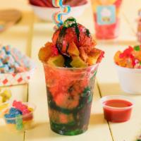 Sour Pickle large · Watermelon shaved ice, pickles red and green chamoy and lucas.