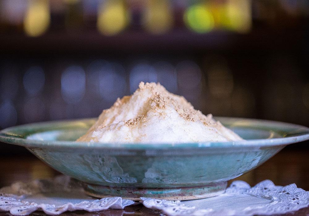 Volcano Potbingsoo · Mixed grain. Shaved ice with red bean paste, condensed milk, powder topping and mochi.