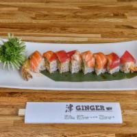 R3. Rocket Roll · Snow crab, avocado and shrimp, tempura inside, topped with salmon, tuna and shrimp with spic...