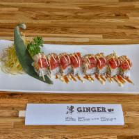 R15. Louisiana Roll · Crawfish, avocado topped with spicy tuna and snow crab.