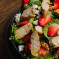 Fragole Salad · Mixed greens, goat cheese, caramelized walnuts, strawberries, grilled chicken and apple-cide...
