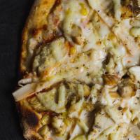 Al Catupiry Pizza · Tomato sauce, catupiry cheese, corn, hearts of palm and chicken.