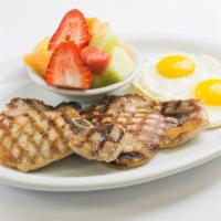 Grilled Pork Chop and Eggs Breakfast · Served with your choice of side and toast. Oatmeal, cream of wheat, grits or bagel for an ad...