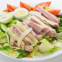 Chef's Salad · Crisp mixed greens, ham, turkey, cheese, tomatoes, cucumbers and hard boiled egg.