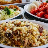 House Combo Fried Rice · Includes chicken, pork, beef, and shrimp.