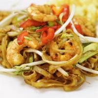 1. Pad Thai Noodle · Rice noodles, scallions, bean sprouts, eggs, red pepper, crushed peanuts in Thai sauce, garn...