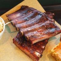 1/2 Rack Pork Ribs...Smoked ＆ Voted Best in the Valley · Served with  2 Regular Sides OR a Side Salad (Garden or Caesar)....Smoked ＆ Voted Best in th...