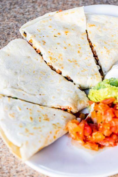 Quesadillas with Cheese · Served with guacamole and sour cream with pico de gallo inside.