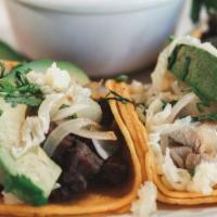 Beef Fajita Street Tacos · 5 taquitos - beef fajita, served on corn tortillas with onions, cilantro, Monterey Jack chee...