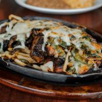 Mixed Fajita Poblano · Topped with sliced poblano peppers, field mushrooms, and melted Monterey jack cheese.  Serve...