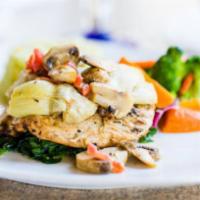 Chicken Gabriela  · Grilled chicken breast served on a bed of spinach topped with filed mushrooms, shrimp, crawf...