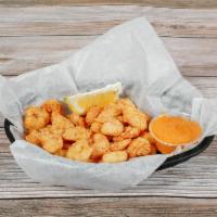 Cajun Popcorn · Tender shrimp corn meal coated with herbs and spices and fried. Served with homemade Creole ...