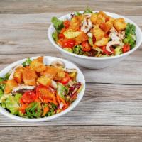 Garden Salad · Mixed greens, garden vegetables and homemade croutons with choice of dressing.