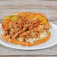 BBQ Chicken Po Boy · Shredded chicken in a spicy and tangy New Orleans sauce, dressed without mayo and creole mus...