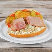 Baked Ham Po Boy · Shredded cabbage, tomato, pickles, mayo, Creole mustard on a New Orleans style French roll.