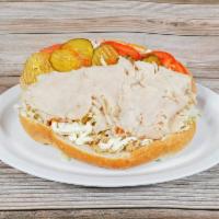 Turkey Po Boy · Shredded cabbage, tomato, pickles, mayo, Creole mustard on a New Orleans style French roll.
