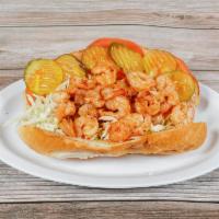 BBQ Shrimp Po Boy · Sauteed shrimp in a spicy and tangy New Orleans BBQ sauce. Shredded cabbage and pickles, ser...