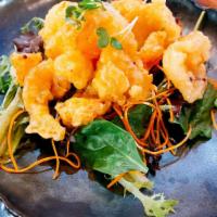 Bang Bang Shrimp  · Fried shrimp tossed with spicy mayo and served over mixed green.