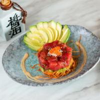 Spicy Tuna Tartar · Fresh spicy tuna and scallions tossed in house yuzu soy sauce with avocado fan. 