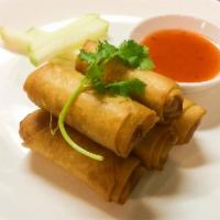 Thai Spring Rolls  · Fried spring rolls, stuffed with glass noodles and vegetables, served with sweet peach sauce.