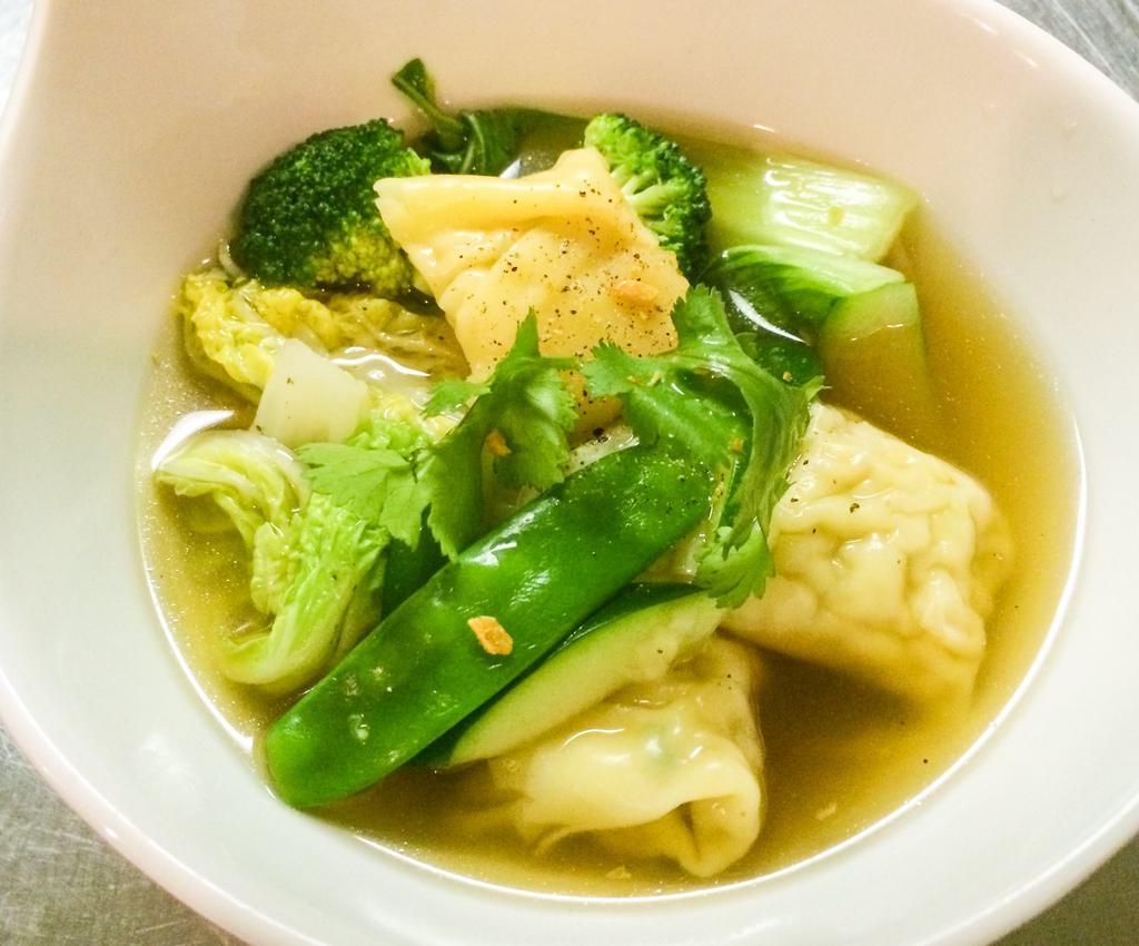 Gyow Nam Soup  · Shrimp and fresh crabmeat ravioli with with vegetables in clear broth.