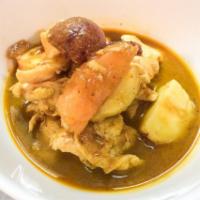 Massaman Curry  · Chicken, beef or jumbo shrimp with coconut milk, tamarind, peanut, tomato and potato (gluten...