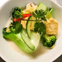 Veggie Tom Ka Soup · Coconut milk soup with lemongrass, galangal with mixed vegetables and tofu, red bell pepper ...
