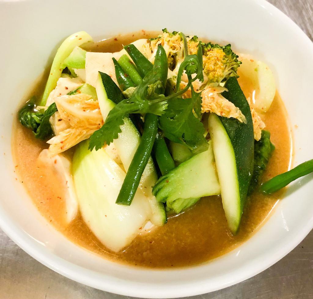 Vegi Tom Yum Soup  · Spicy. Hot and sour soup with mixed vegetables and tofu, milk, lemongrass, red bell pepper and mushroom.