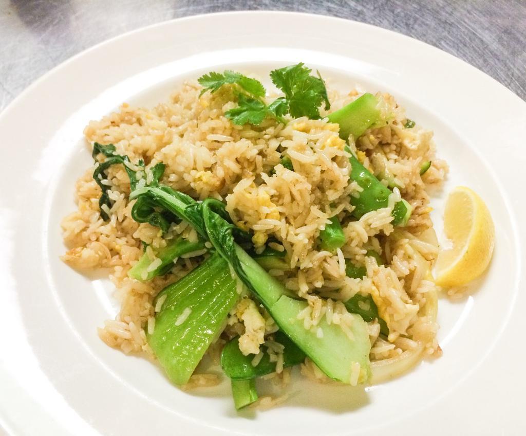 Vegetable Fried Rice  · Choice of pineapple fried rice with egg, fried rice with egg or basil fried rice with egg, tofu and mixed vegetables (gluten free available).