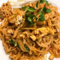 Vegetable Pad Thai  · Stir fried rice noodle with tofu, egg, bean curd, scallion, beansprout and ground peanut in ...