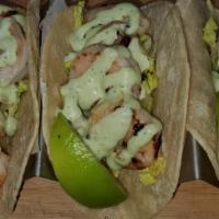 Grilled Shrimp Tacos · 3 Soft corn tortillas, lettuce and cilantro aioli