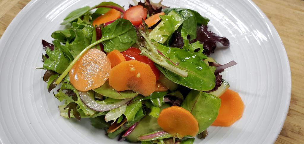 House Salad · Mixed greens, tomato, pickled carrots, cucumber, red onion, & homemade vinaigrette
