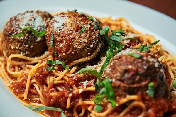 Spaghetti and Meatballs · Spaghetti in a homemade marinara sauce with three meatballs.