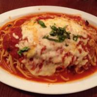 Chicken Parmesan · Baked chicken cutlet covered in fresh mozzarella and marinara sauce with choice of side of p...