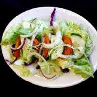 Garden Salad · Lettuce, tomato, onion, and cucumber with your choice of dressing.
