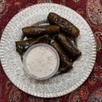 Stuffed Grape Leaves · Dolmeh. Grape leaves picked off the grape vine stuffed with rice and a variety of herbs.